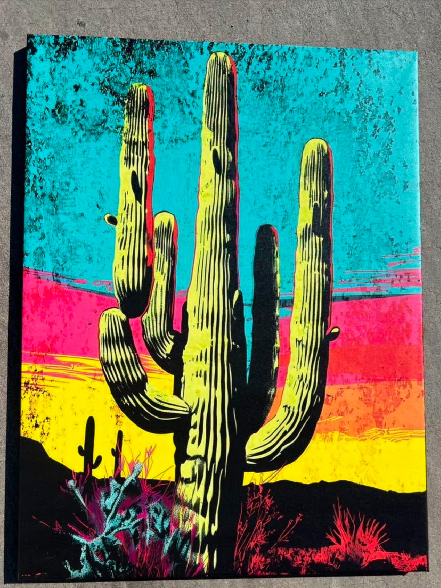 Colorful illustration of a saguaro cactus with a textured background